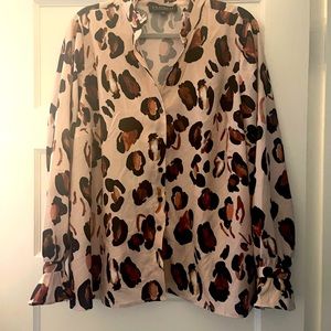 Ruffle collar cheetah print blouse.